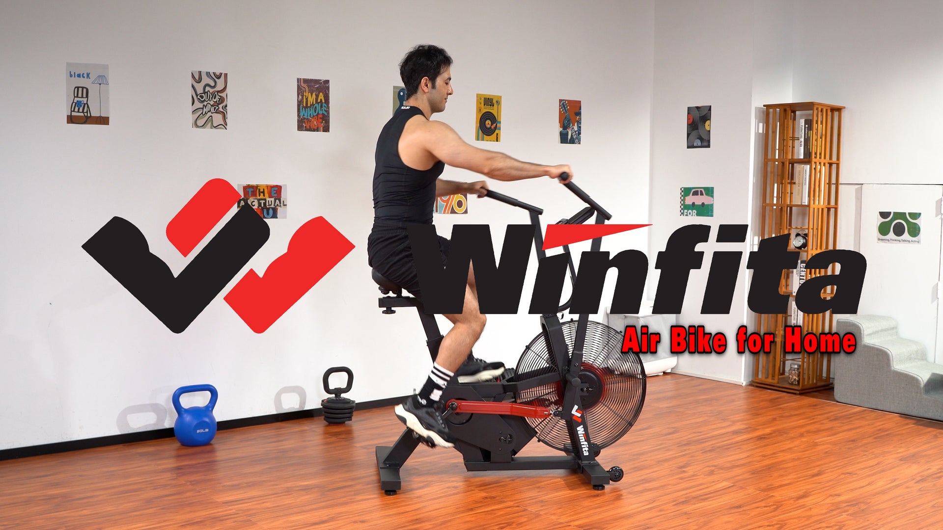 Load video: Winfita Air Bike Exercise Bike Air Resistance Stationary Bike for Home